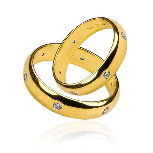 Argollas de matrimonio amor de rosas, fabricadas en oro 18 quilates de Joyería Caracas, viene con certificado de calidad y garantía de por vida.