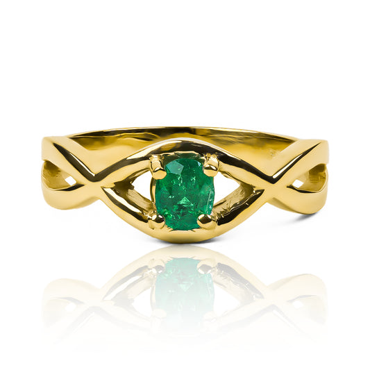 Anillo Infinity Esmeralda, fabricado por Joyería Caracas en oro 18k de la más alta calidad y un certificado de garantía de por vida.