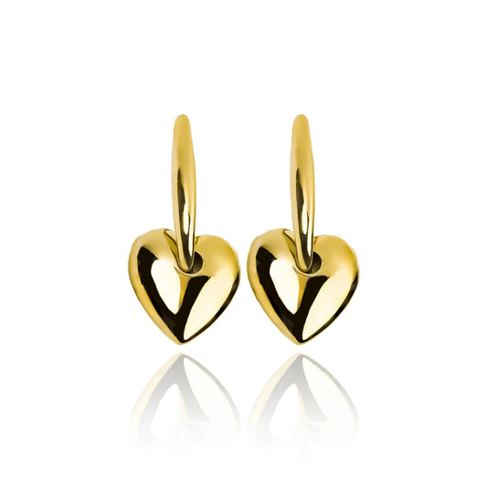 Candongas Arete Corazón, elaborada en oro 18k por Joyería Caracas. Además, cuenta con una garantía para toda la vida, asegurando su calidad y durabilidad.