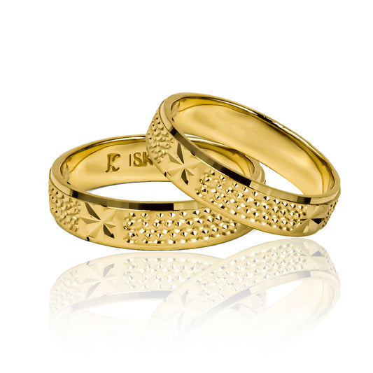 Argollas de matrimonio Starry Sky de Joyería Caracas, fabricadas en oro de 18K, cuentan con garantían de por vida.