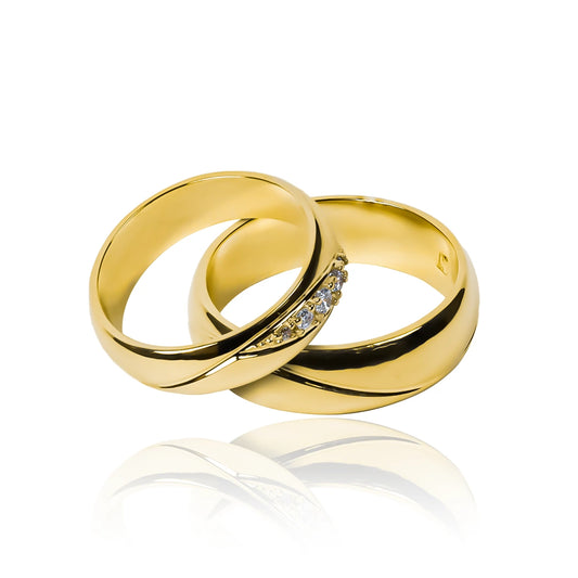 Argollas de matrimonio Atlantis II, fabricadas por Joyería Caracas en oro de 18 quilates con certificado de calidad.