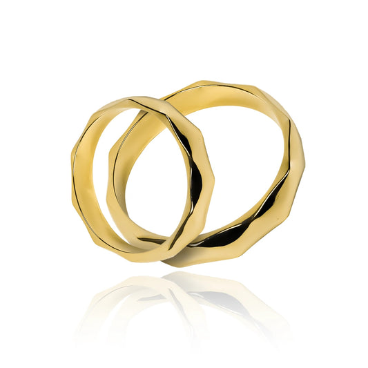 Argollas de matrimonio Geometry. Fabricadas en oro de 18K por Joyería Caracas. Cuenta con garantía de por vida.