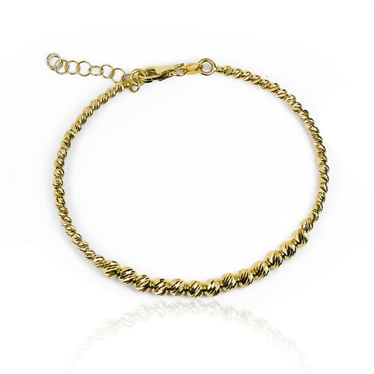 Pulsera Diamantada sin fin fabricada en Oro 18K por Joyería Caracas. Además, cuenta con una garantía para toda la vida.