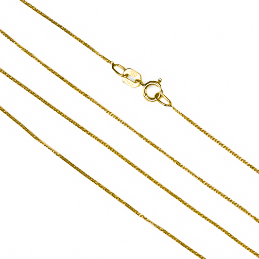 Cadena Mini Cubana fabricada en oro 18k por Joyería Caracas, cuenta con una garantía de por vida.