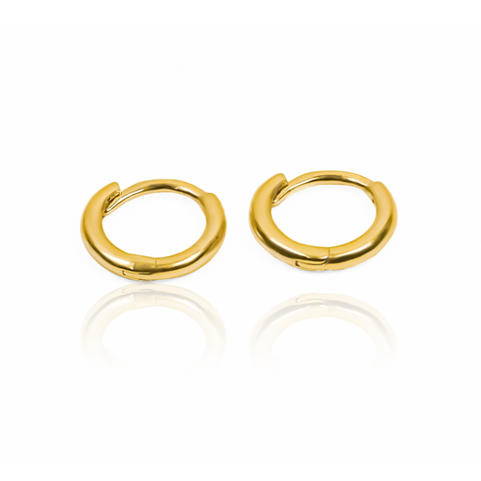 Descubre la elegancia y el lujo con las Candongas Sin fin SS - I. Están hechas con oro de 18K de calidad premium por Joyería Caracas, y cuentan con una garantía de por vida. Tendrás un accesorio refinado y exclusivo para toda la vida.