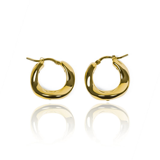 Candongas Irrégulier, elaboradas en oro 18K por Joyería Caracas. Con su garantía para toda la vida.