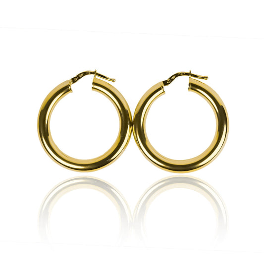 Candongas Tubo Clásica SM I fabricadas en oro de 18K por Joyería Caracas. Con garantía de por vida.