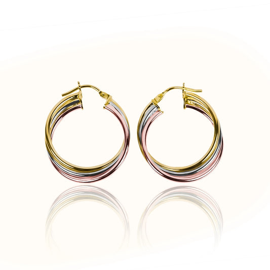 Candongas aros espiral, elaboradas en oro 18K por Joyería Caracas. Con su garantía para toda la vida.