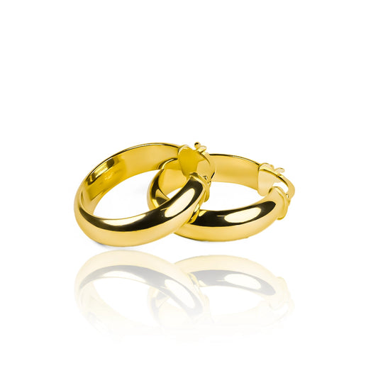 Candongas Medio tubo SM elaboradas en oro de 18K por Joyería Caracas, esta pieza exclusiva ofrece una garantía de por vida.