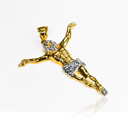 Dije Cristo XXL en oro de 18K de Joyería Caracas. Este elegante dije cuenta con una garantía de por vida.