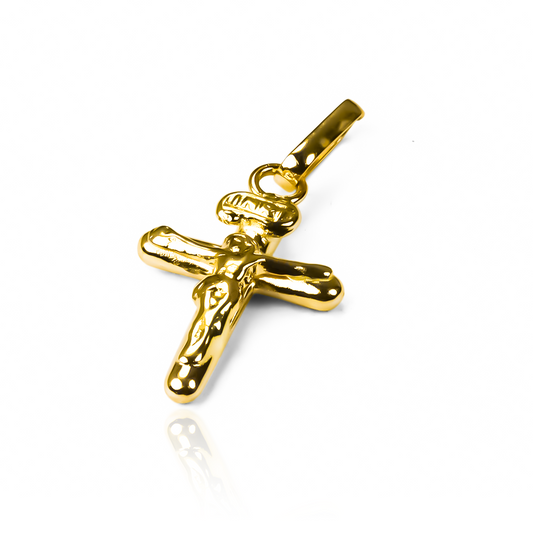 Dije Cristo inri SM JT. Hecho con Oro 18K de Joyería Caracas, cuenta con garantía de por vida.