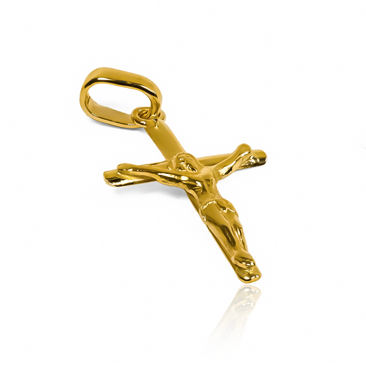 Dije Cruz Cristo M JC son el complemento perfecto para cualquier outfit. Hechos en oro 18K de la prestigiosa Joyería Caracas, cuenta con garantía de por vida.