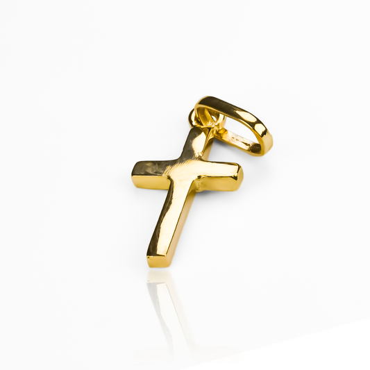 Dije de Cruz lisa están elaborados en oro 18K de la prestigiosa Joyería Caracas. Con garantía para toda la vida.