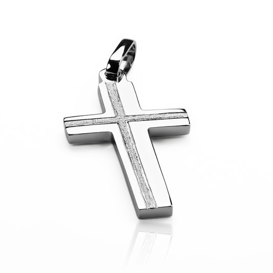 Dije Cruz plana L facetada JC en oro 18K de Joyería Caracas. Cuenta con garantía de por vida.