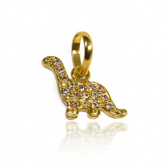 Dije Dino cristales JT de oro 18K de Joyería Caracas. Un lujo atemporal con un toque de elegancia, con garantía de por vida para asegurar su calidad.