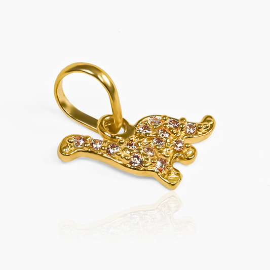 Dije Dino cristales JT de oro 18K de Joyería Caracas. Un lujo atemporal con un toque de elegancia, con garantía de por vida para asegurar su calidad.