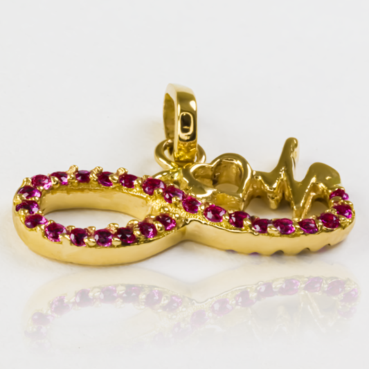 Dije Electro heart Infinity. Fabricado con Oro 18K de la prestigiosa Joyería Caracas, cuenta con garantía de por vida.