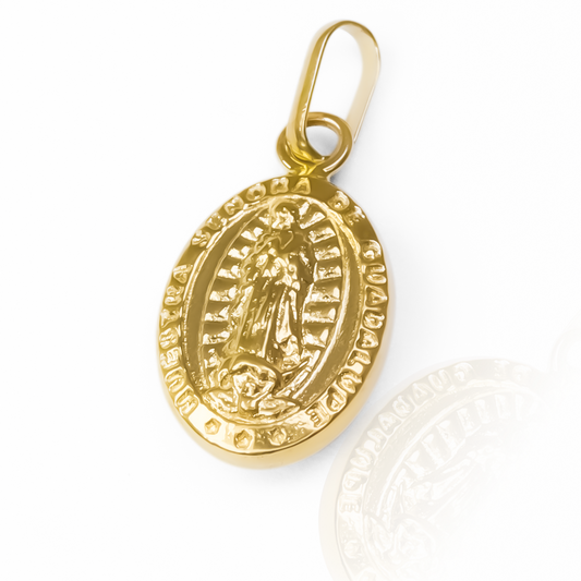 Dije Guadalupe JT M, una pieza de oro 18K con el sello de calidad de Joyería Caracas y garantía de por vida.