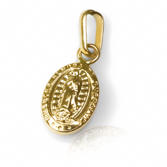 Dije Guadalupe JT S. Hecho con oro de 18K, esta joya de Joyería Caracas, cuenta con garantía de por vida.