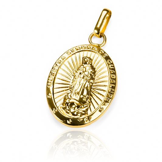 Dije Guadalupe XXL JT con acabado en oro 18K. Con diseño de la prestigiosa Joyería Caracas y respaldado por una garantía de por vida.