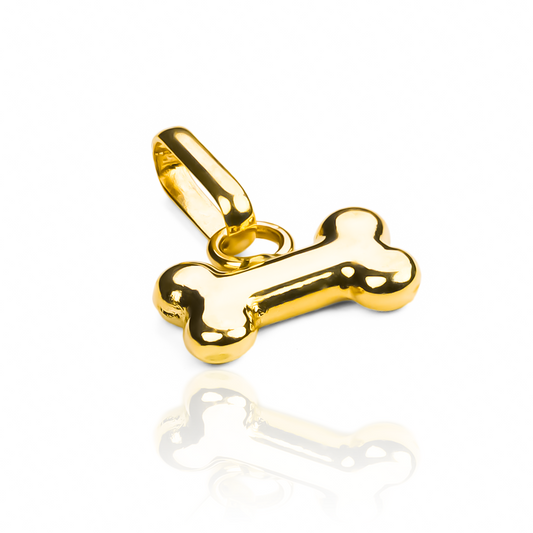 Dije Huesito. Hecho con oro de 18K y elaborado por Joyería Caracas, su calidad es indudable. Además, cuenta con una garantía para toda la vida.