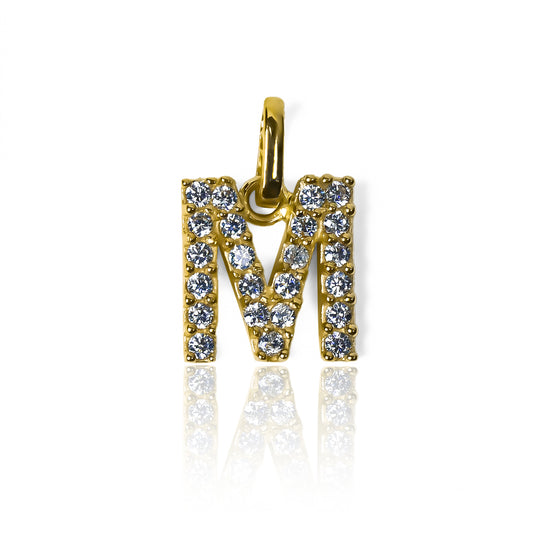 Dije Letra M crystal JC. Hecho de Oro 18K y diseñado por Joyería Caracas, cuenta con garantía de por vida.
