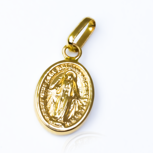 Dije Milagrosa JT M es un accesorio de joyería exclusivo de Oro 18K de Joyería Caracas. Con una garantía para toda la vida.