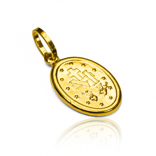 Dije Milagrosa bisel oración M I es una joya de oro 18K de la prestigiosa Joyería Caracas. Cuenta con garantía de por vida.