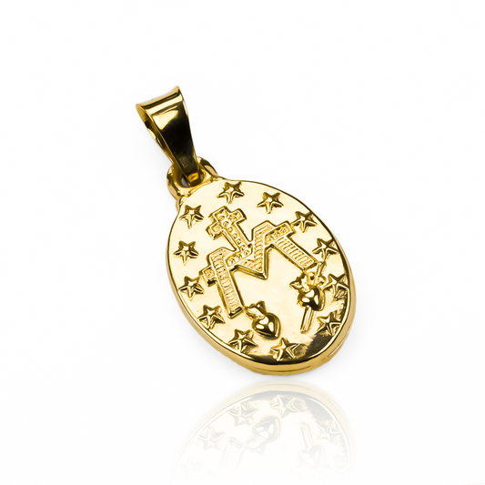 Dije Milagrosa facetada MI está elaborada con oro 18K y es una creación de la prestigiosa Joyería Caracas. Con garantía para toda la vida.