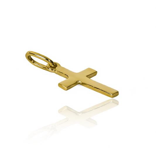 Dije Mini cruz plana JC. Hecho con oro 18K y creado por Joyería Caracas, este dije es una verdadera obra de arte. Con garantía para toda la vida.