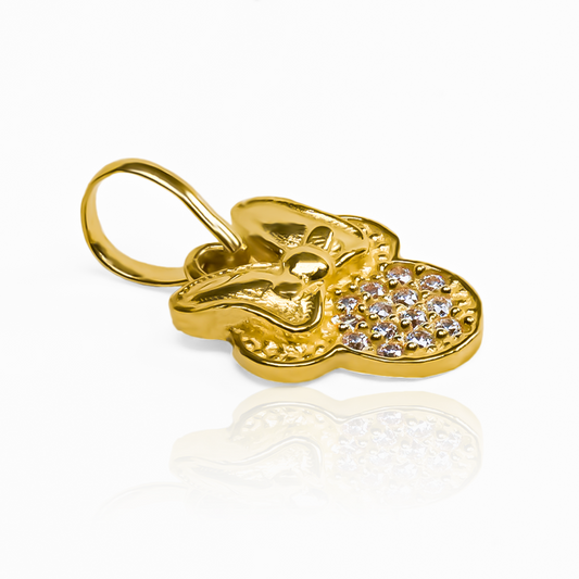 Dije Minnie con cristales JT en oro 18K. Hecho por Joyería Caracas con una garantía para toda la vida.
