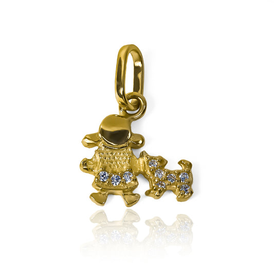 Dije de niña y perro, adornado con cristales y hecho de oro 18K. Con la calidad de Joyería Caracas y una garantía para toda la vida.