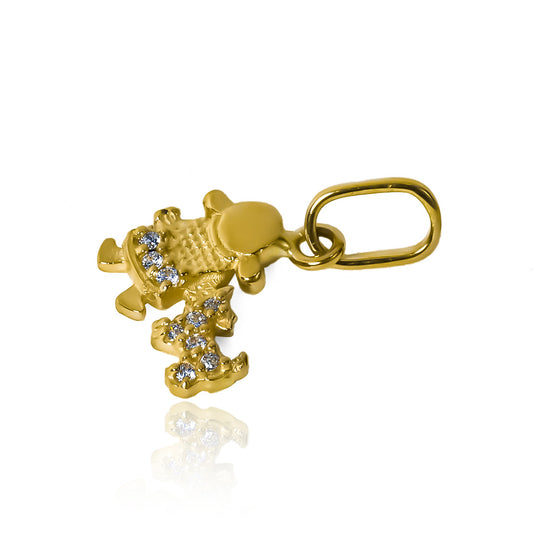 Dije de niña y perro, adornado con cristales y hecho de oro 18K. Con la calidad de Joyería Caracas y una garantía para toda la vida.