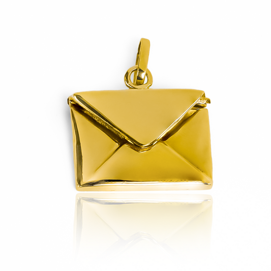 Dije Secret. Hecho con oro de 18K y diseñado por la reconocida Joyería Caracas, cuenta con garantía de por vida.