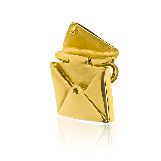 Dije Secret. Hecho con oro de 18K y diseñado por la reconocida Joyería Caracas, cuenta con garantía de por vida.