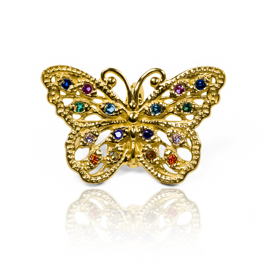 Dije multicolor Butterfly JT. Confeccionado con oro 18k y diseñado por la prestigiosa Joyería Caracas, cuenta con garantía de por vida.