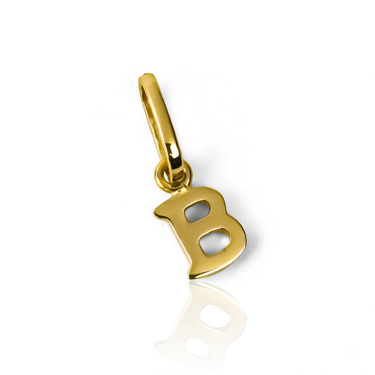 Dije Letra B mini JC está hecho de oro 18K y es una joya exclusiva de Joyería Caracas. Con su garantía de por vida.