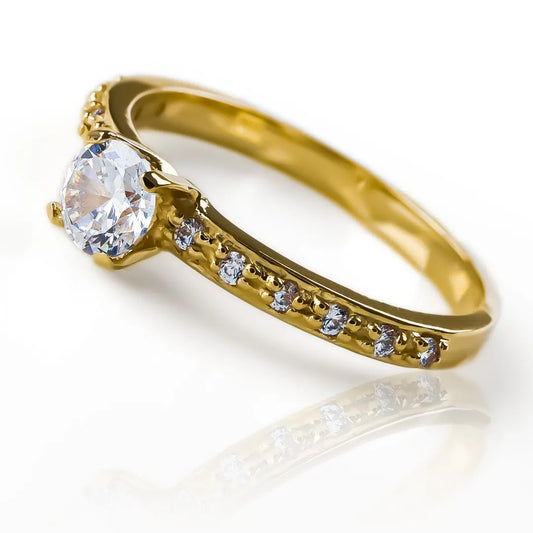 Anillo de compromiso eternity, fabricado en oro 18k de Joyería Caracas, cuenta con certificado de calidad y garantía de por vida.
