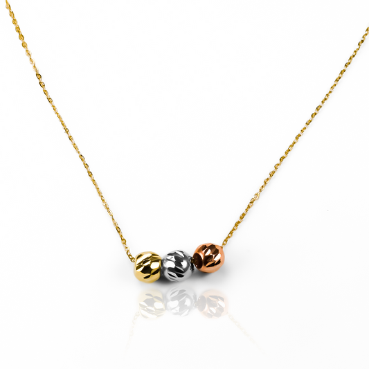 Gargantilla ilusión S45 Tres oros! Hecha de oro 18K y fabricada por Joyería Caracas, esta pieza es una verdadera obra de arte. Ofrecemos una garantía para toda la vida.