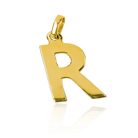 Dije Letra R lisa JT es una pieza exclusiva de joyería de la prestigiosa marca Oro 18K. Fabricado por Joyería Caracas, con garantía de por vida.