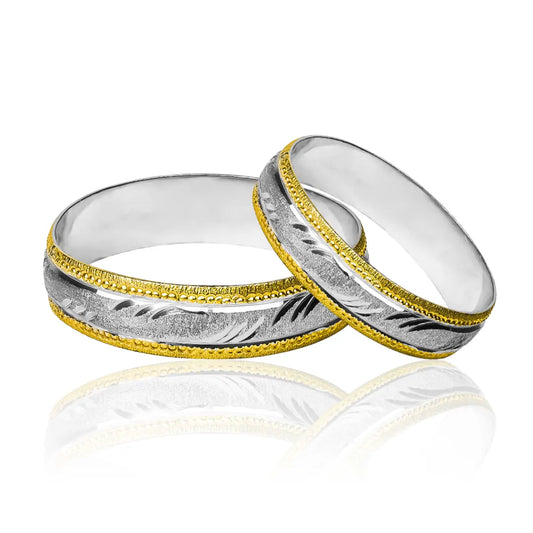 Argollas de Matrimonio Olas Facetadas, fabricadas en oro de 18k de Joyería Caracas, cuentan con certificado de calidad y garantía para toda la vida.