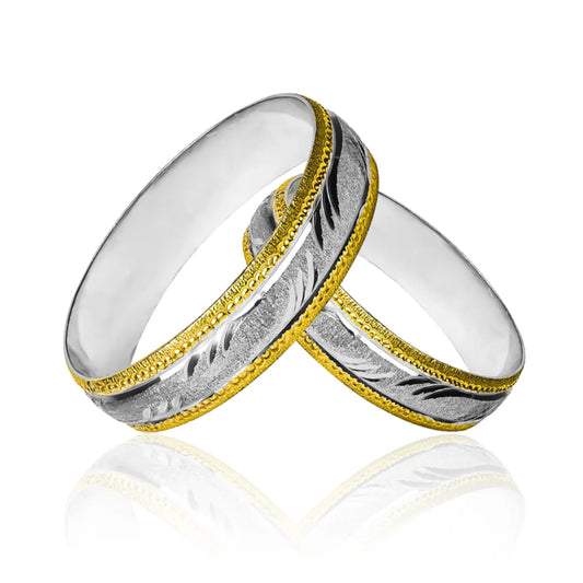 Argollas de Matrimonio Olas Facetadas, fabricadas en oro de 18k de Joyería Caracas, cuentan con certificado de calidad y garantía para toda la vida.