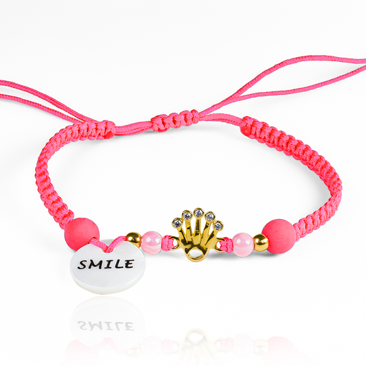 Pulsera Crown + Balls #3 de Joyería Caracas está hecha en oro 18k, con detalles en hilo coreano y bisutería de calidad. Con garantía de por vida y sin costo adicional.