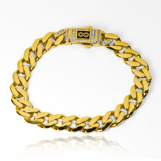 Pulsera tipo cubana con tipo de cierre de broche con piedras circones engastados.