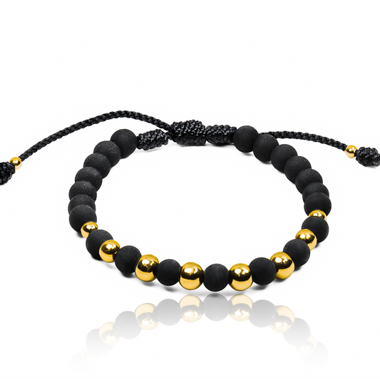 Pulsera Esferas Lisas Degrade de Joyería Caracas está hecha en oro 18k, con detalles en hilo terlenca y bisutería de calidad. Con garantía de por vida y sin costo adicional.