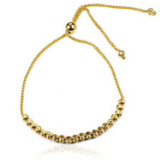 Pulsera Esferas facetadas I fabricada en oro 18 quilates por Joyería Caracas, cuenta con un certificado de calidad y garantía de por vida.