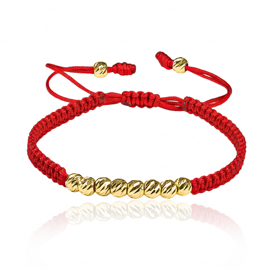 Pulsera Facetadas #5 X10 de Joyería Caracas está elaborada en oro 18k, con detalles en hilo coreano y bisutería de calidad. Con garantía de por vida y sin costo adicional.