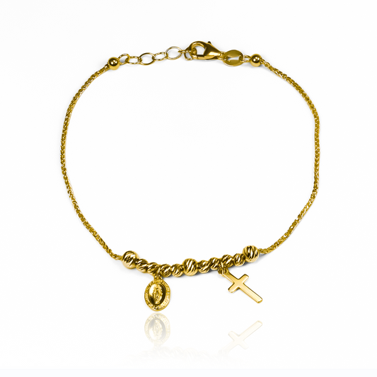 Pulsera Guadalupe cruz I fabricada en Oro 18K por Joyería Caracas, cuenta con un certificado de calidad y garantía para toda la vida.