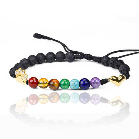 Pulsera Huellita y Corazón Puente Arcoíris de Joyería Caracas está elaborada en oro 18k, con detalles en hilo coreano y bisutería de calidad. Con garantía de por vida y sin costo adicional.