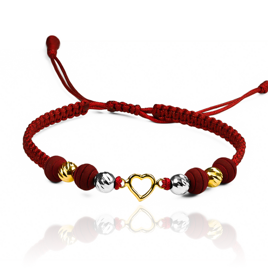 Pulsera Mini Corazón + Esferas #5 Facetadas de Joyería Caracas está elaborada en oro 18k, con detalles en hilo coreano y bisutería de calidad. Con garantía de por vida y sin costo adicional.